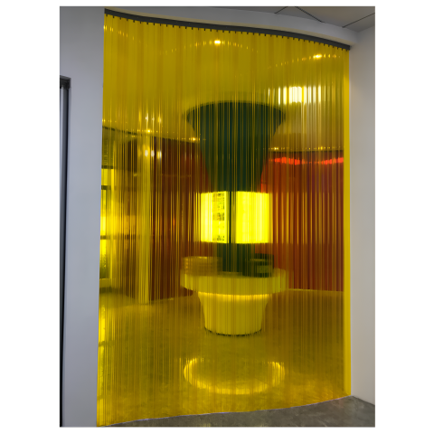 Anti-insect yellow PVC strip curtain installed in a doorway, creating a transparent barrier.