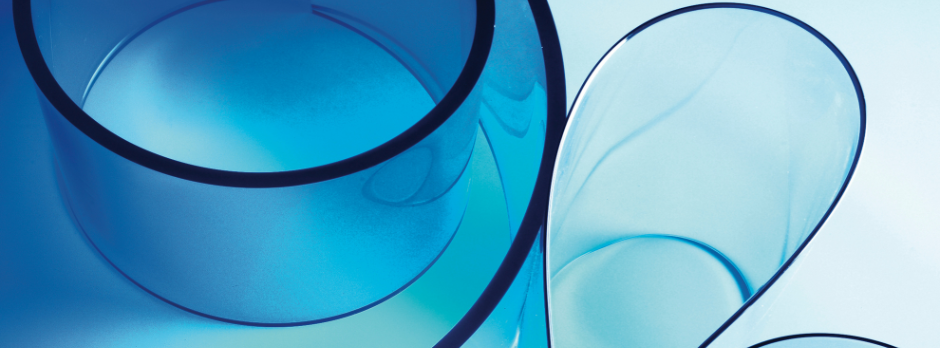 Curved layers of translucent blue flexible vinyl strips with smooth textures.